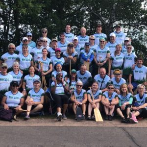 Combined team photo of Team Blue and Green at the Lake Superior Dragon Boat Festival